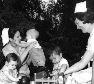 Karitane Nurses playing with three children