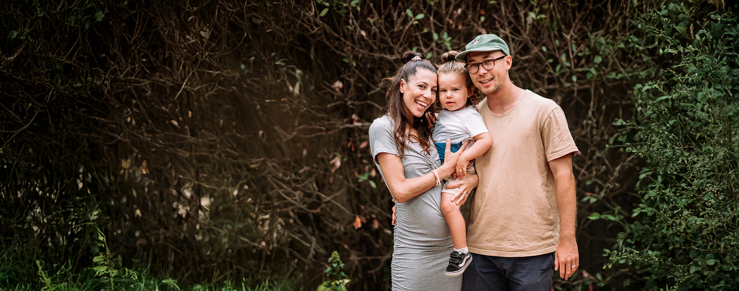 A family portrait of a happy family who used Karitane services
